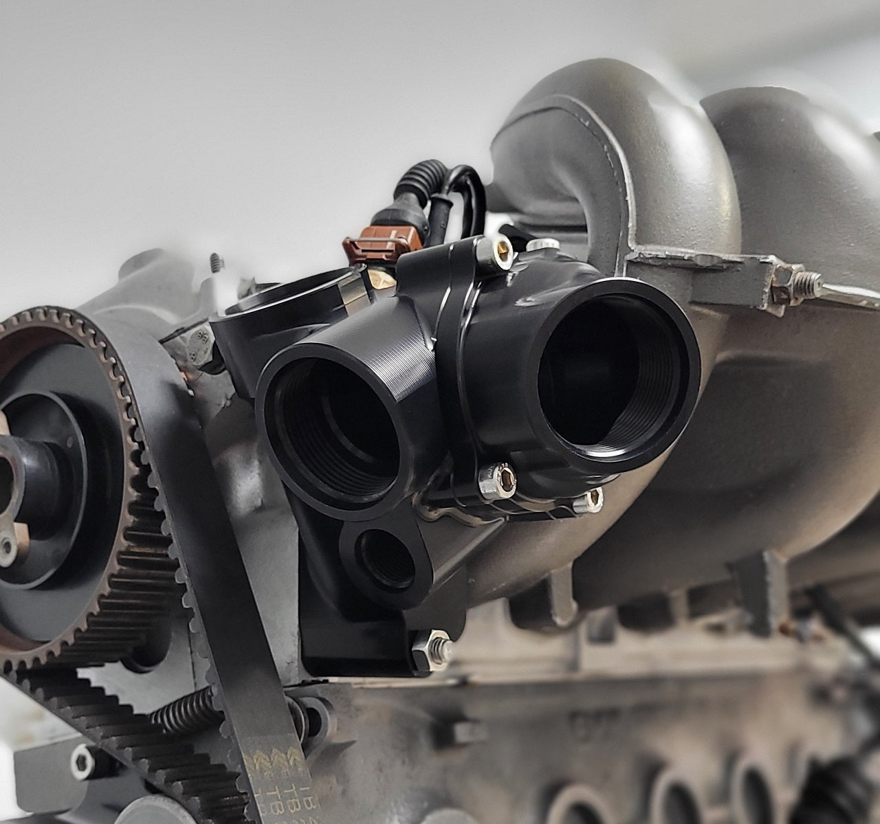 thermostat housing for bmw e30