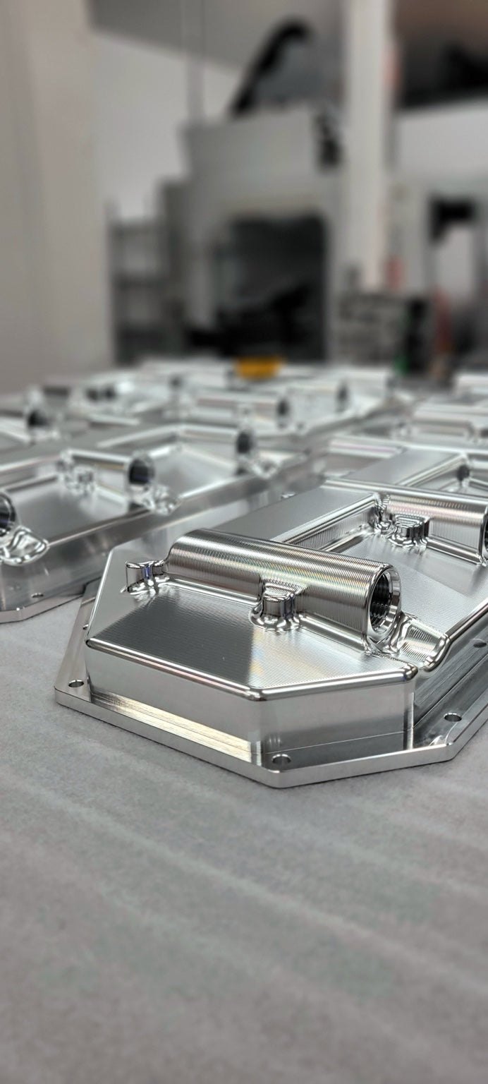 Rows of billet aluminum components during production
