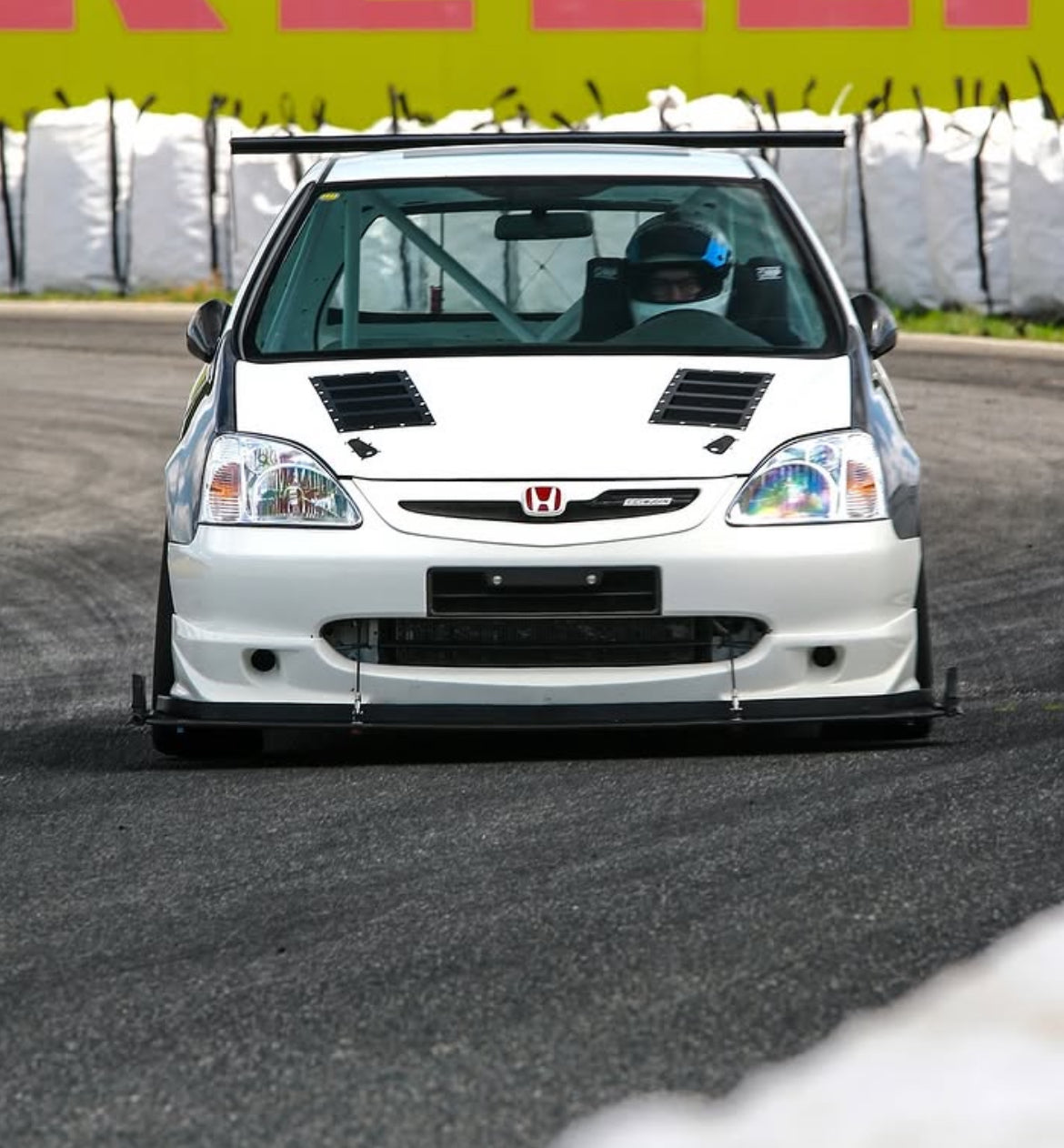 White Honda EP3 track car fitted with hood vents